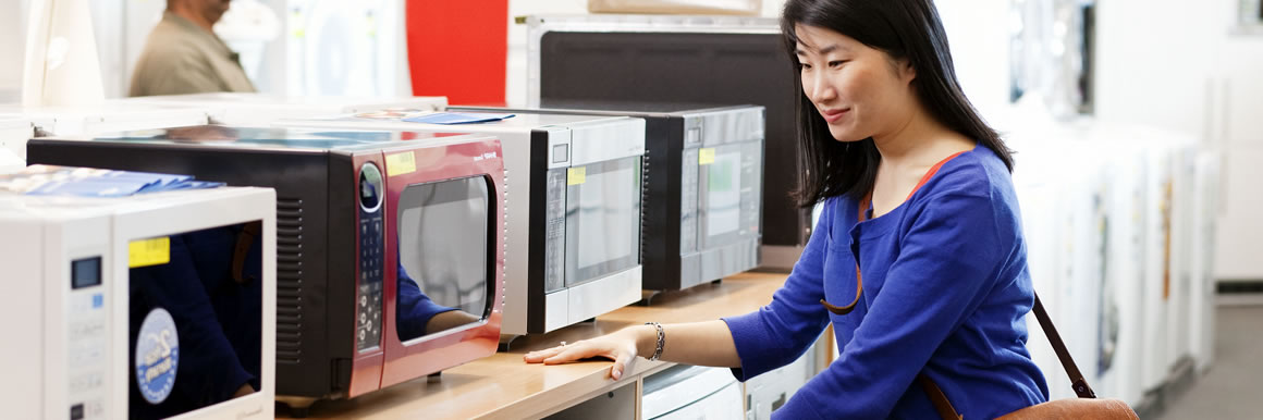 Customer shopping for electrical appliances.
